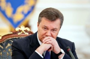 Янукович обещает уволить своих коллег и помиловать протестующих