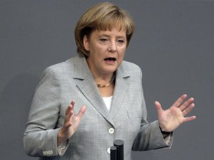 Меркель настаивает на проведении мирных переговоров