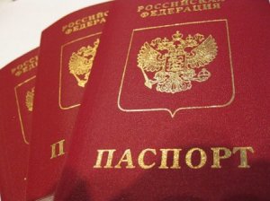 1,8 млн жителей Крыма получили паспорта РФ. ФМС начала выдавать загранпаспо ...