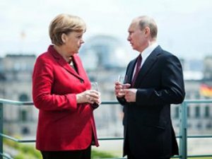 Меркель с Путиным взялись за обсуждение перемирия на Украине